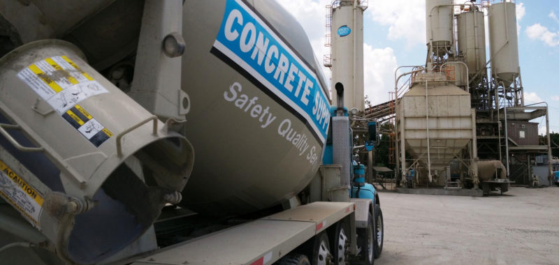 Concrete supply co mixing truck in front of plant